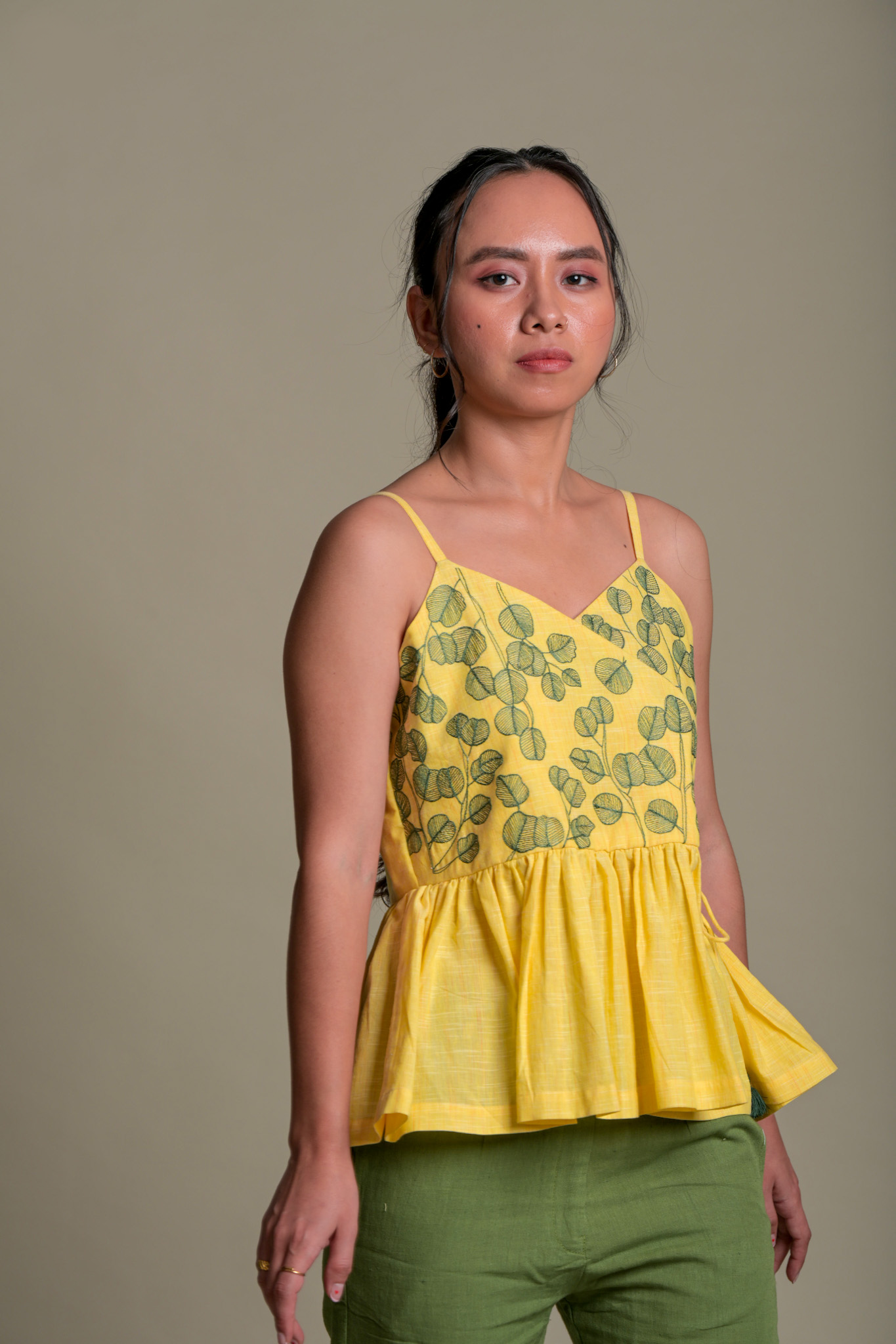 Leaf Embroidered Peplum Strap Top